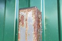 Столб из черной трубы с покраской